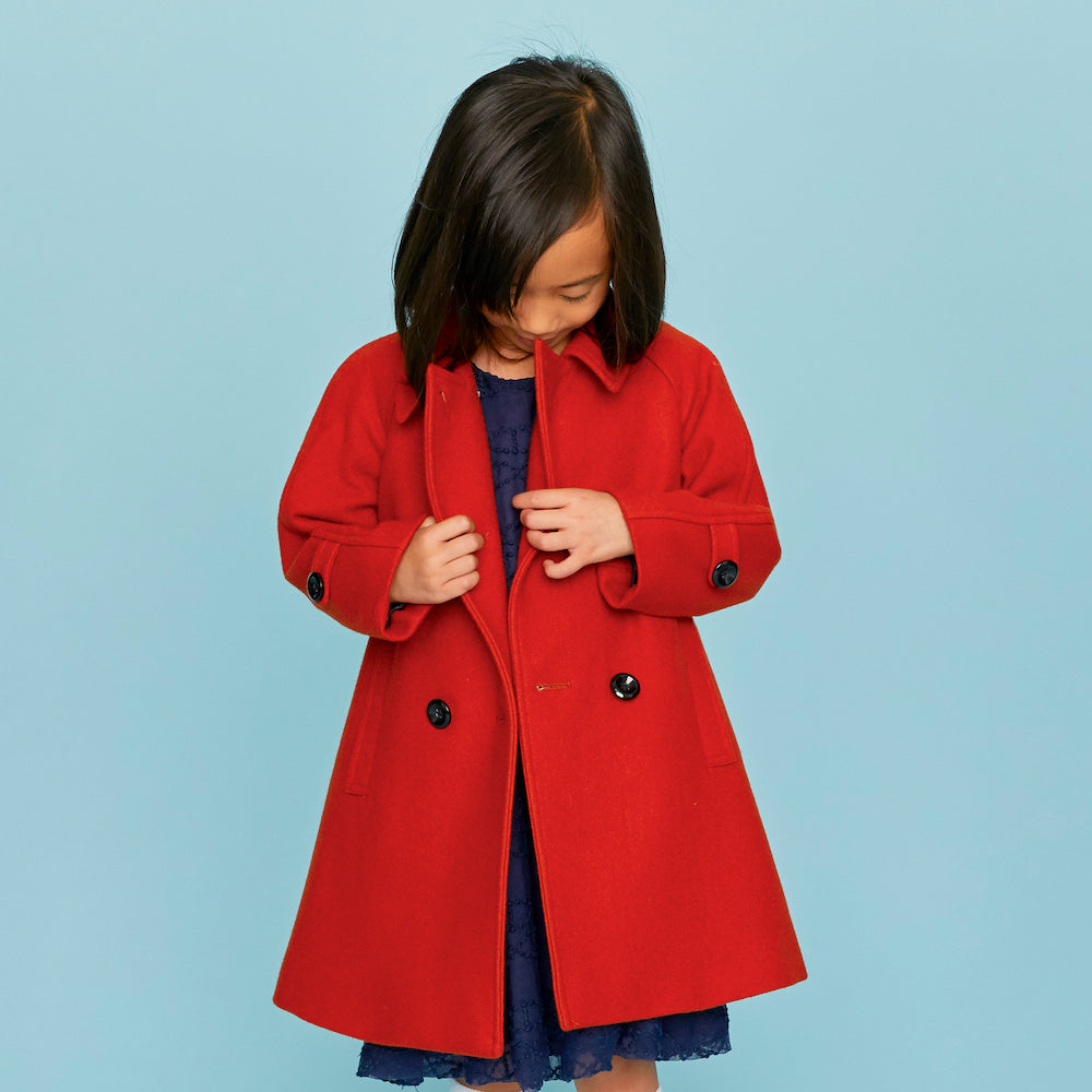 Orange coat girl on sale